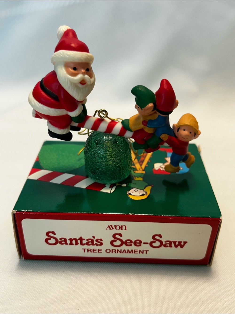 In Box Vintage 1983 Avon Santa’s See-Saw Christmas Ornament Eleves Gumdrop Red
